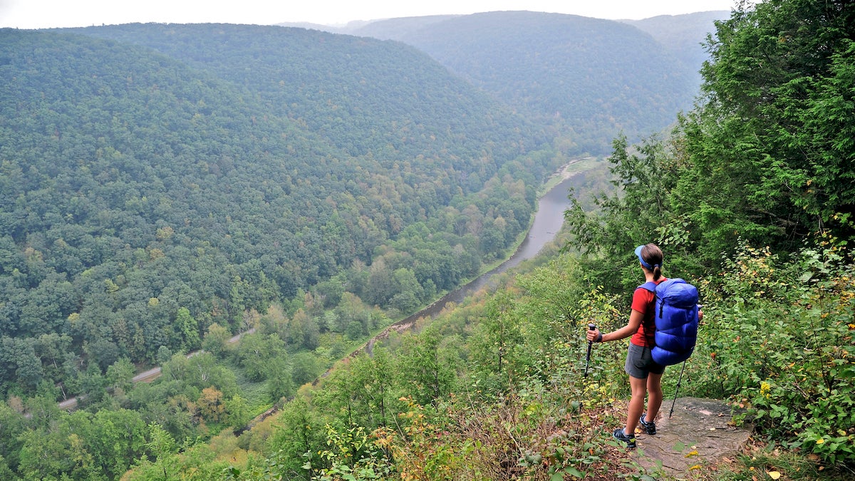 Woman backpacker hiking