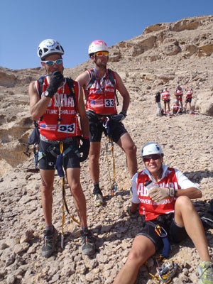 13-day2-via-ferrata-wait.jpg 27591 The team waits at the top of the via ferrata, a technical section of exposed rock where racers clip into fixed rope to protect against falls while…