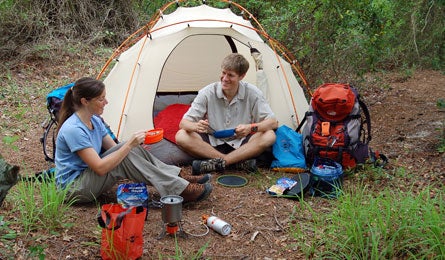 "Sheri and Randy Propster relax in camp"