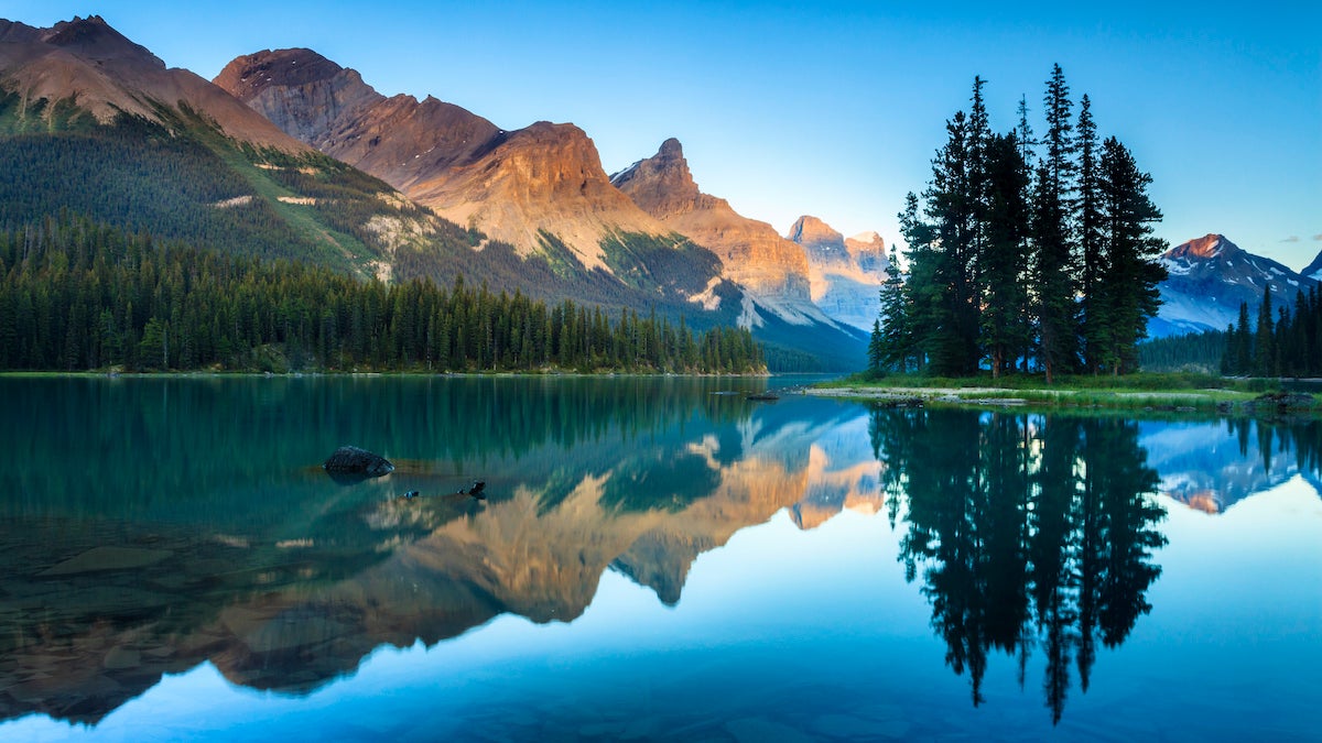 Spirit Island and Maligne Lake at dusk. Jasper National Park, Alberta, Canada