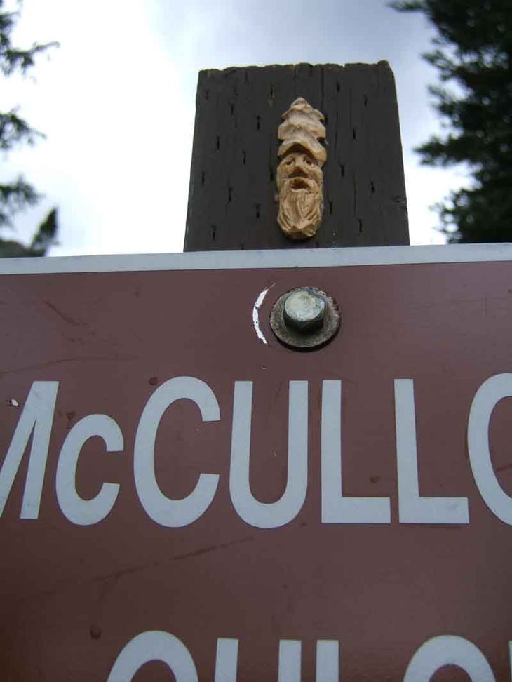 Handcarved detail on trailhead sign None