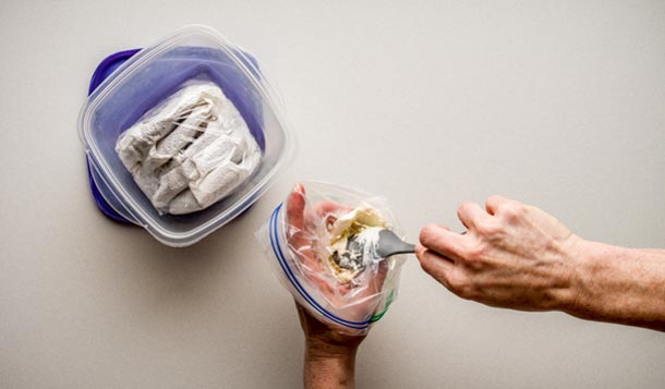 Cheesecake: Step 3 In camp Make the filling: Fold the quart-size freezer bag over your hand to make a little cup. Unwrap the cream cheese and add a little of the sugar…