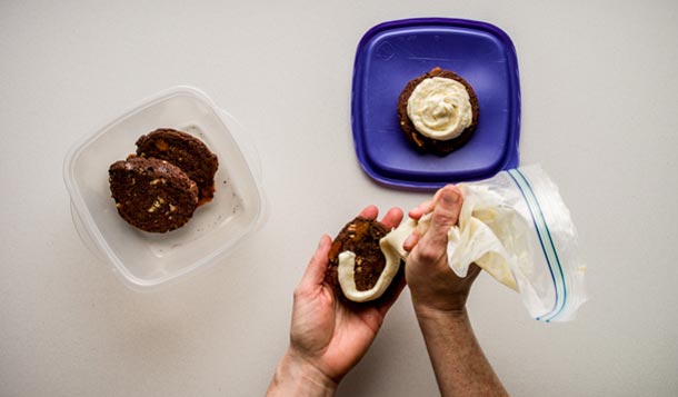 Cheesecake: Step 5 Assemble the sandwiches: Snip the corner of the bag where the cream cheese is, and squeeze to pipe filling onto bottoms of two cookies, mounding in…