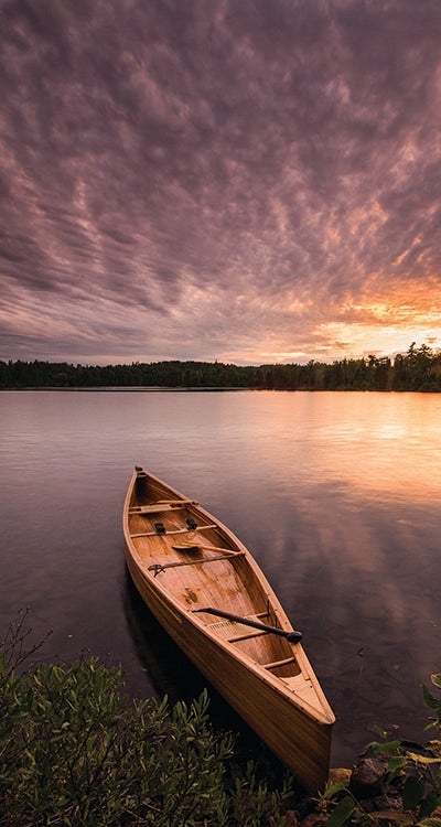 Canoe at Sunset Boundary Waters, Minnesota image by Bryan Hansel