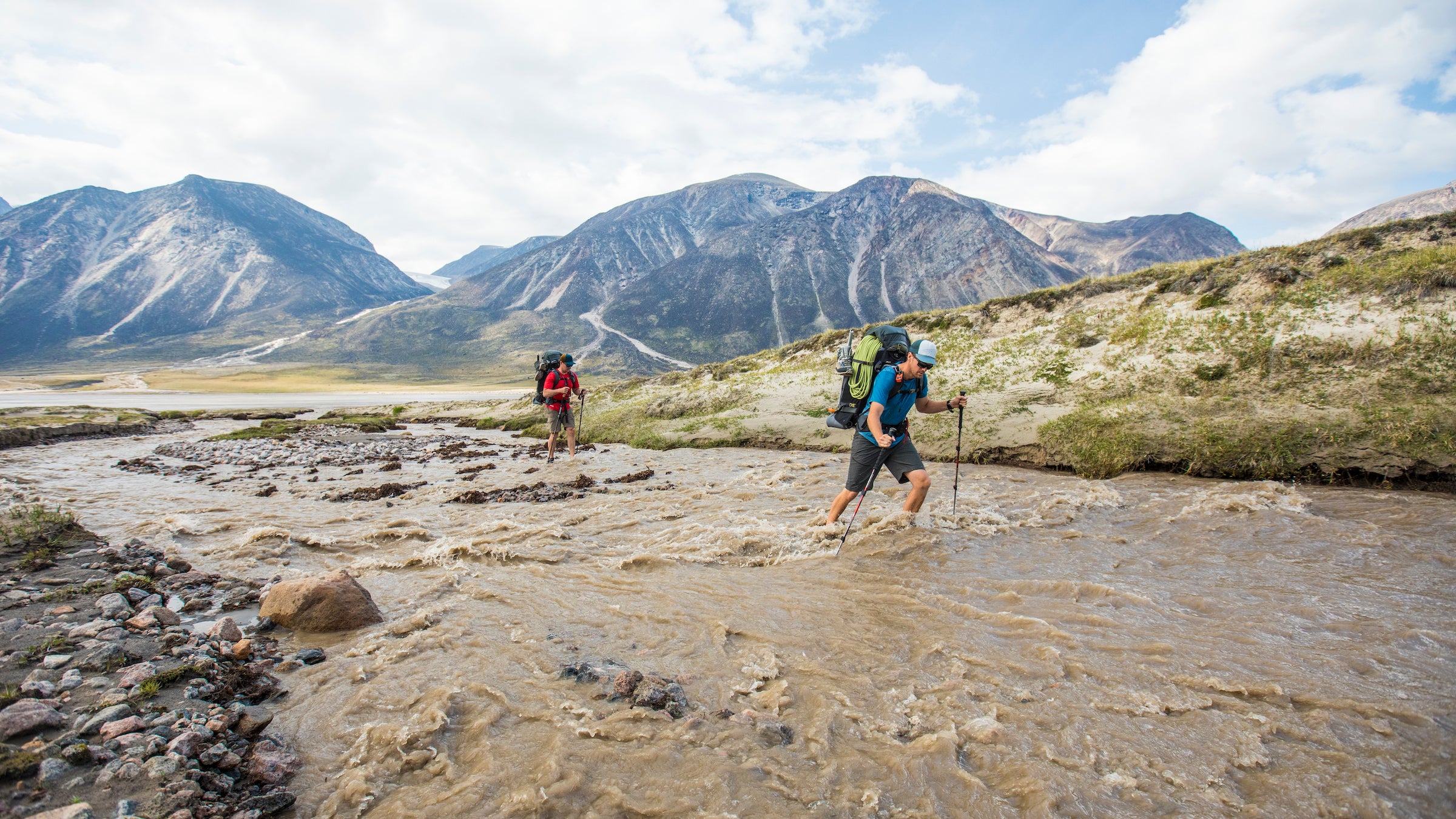 people crossing a river