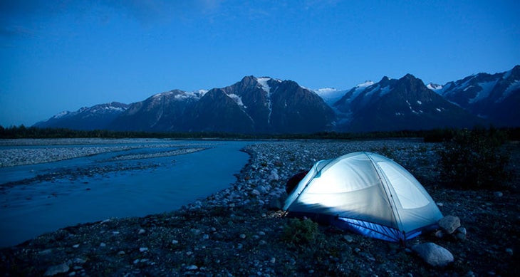 Photos by Justin Bailie View of tent as seen while on raft trip down the Tashenshini River. The \