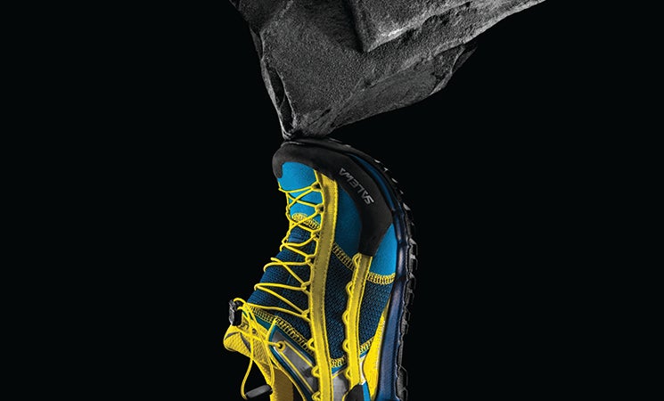 "Salewa’s Speed Ascent versus very big rock: Not only does this shoe have a stiffened midsole, it employs 36 lace loops for dialing in the perfect fit."