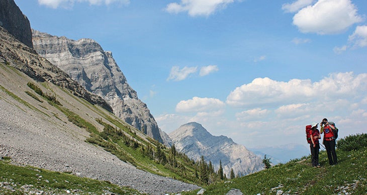 Discover the Other Rockies Hikers stop to snap photos of the glacial cirque midway through the trek. photo: Kelsey Kerlan