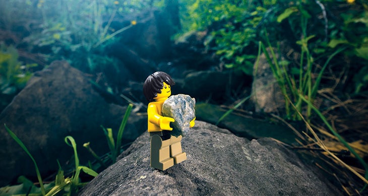 Lego Man Training With Rock Lego men have one of the highest strength-to-weight ratios in the entire toy taxonomy. photo: Andrew Bydlon