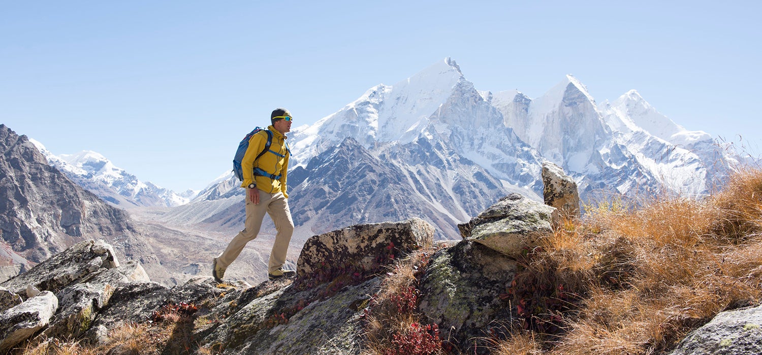 "Eddie Bauer ambassador Jake Norton hikes in the mountains."