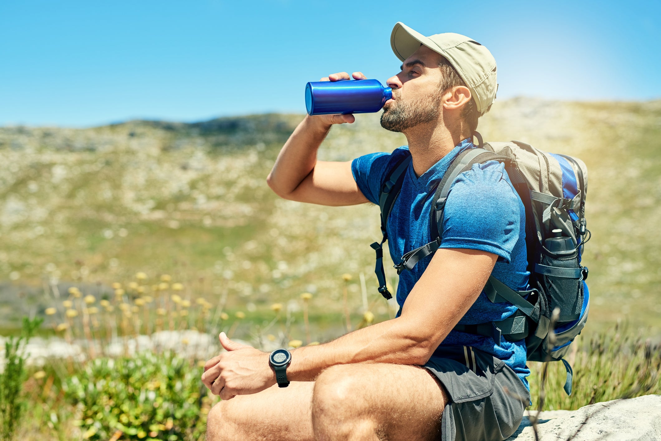 "drinking water on a hike"