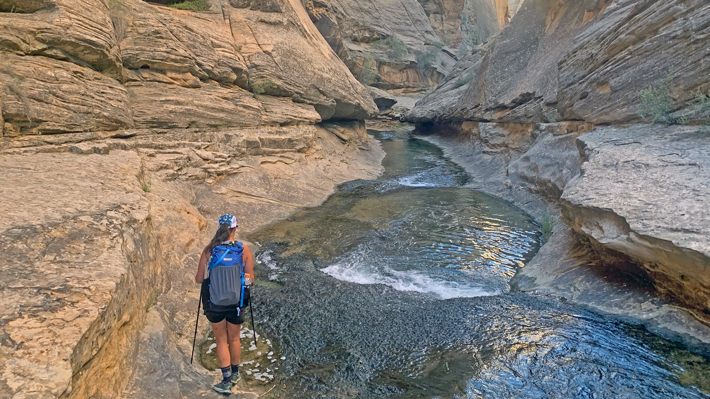 Hiking down a canyon through a river