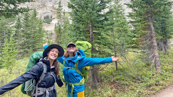 two hikers in forest