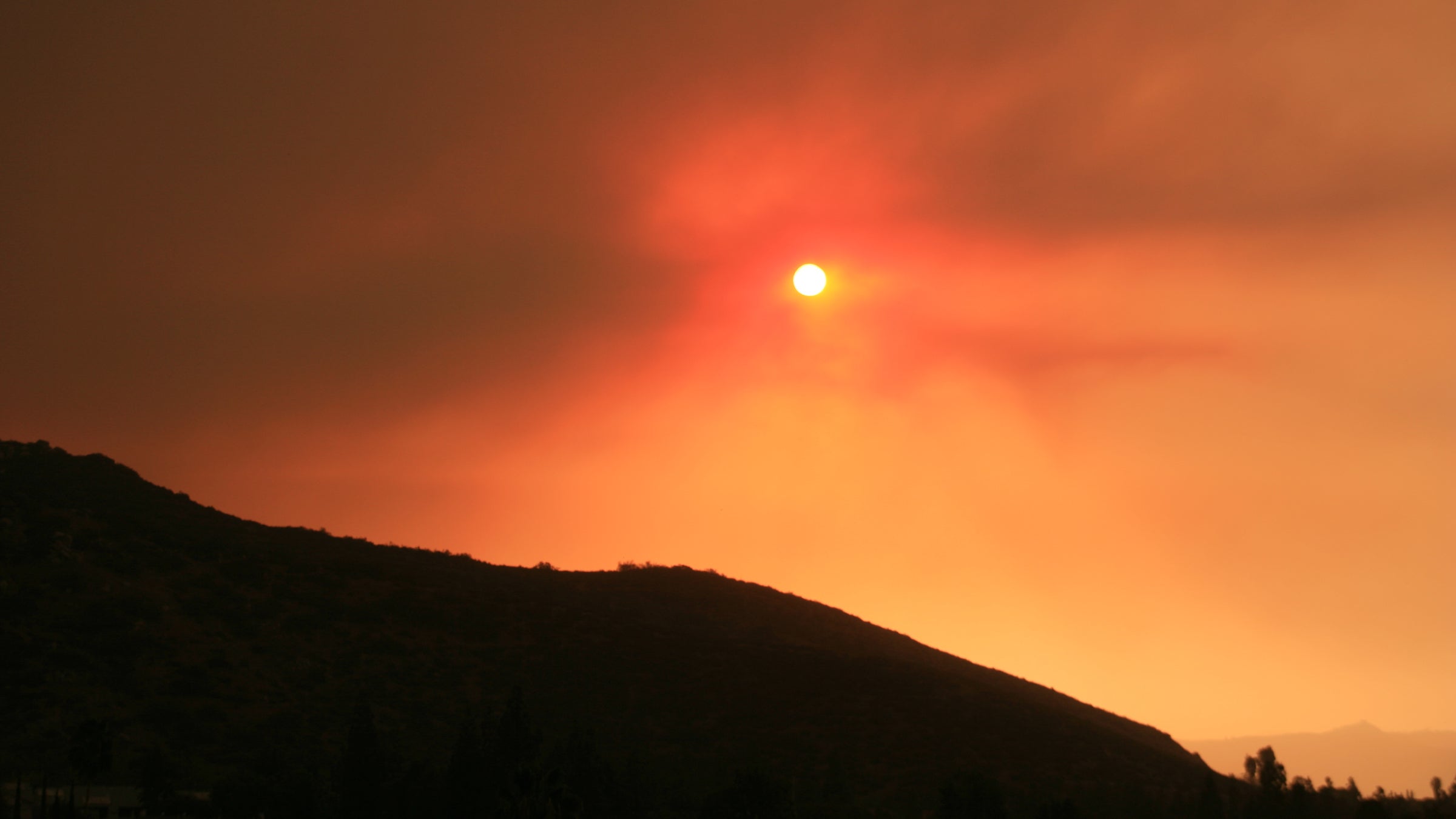 Wildfire smoke casts a pall over the sky near San Diego.