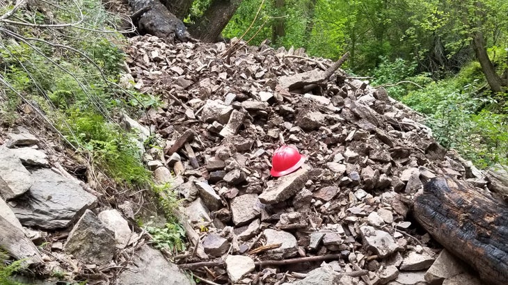 debris covers the trail to Hanging Lake