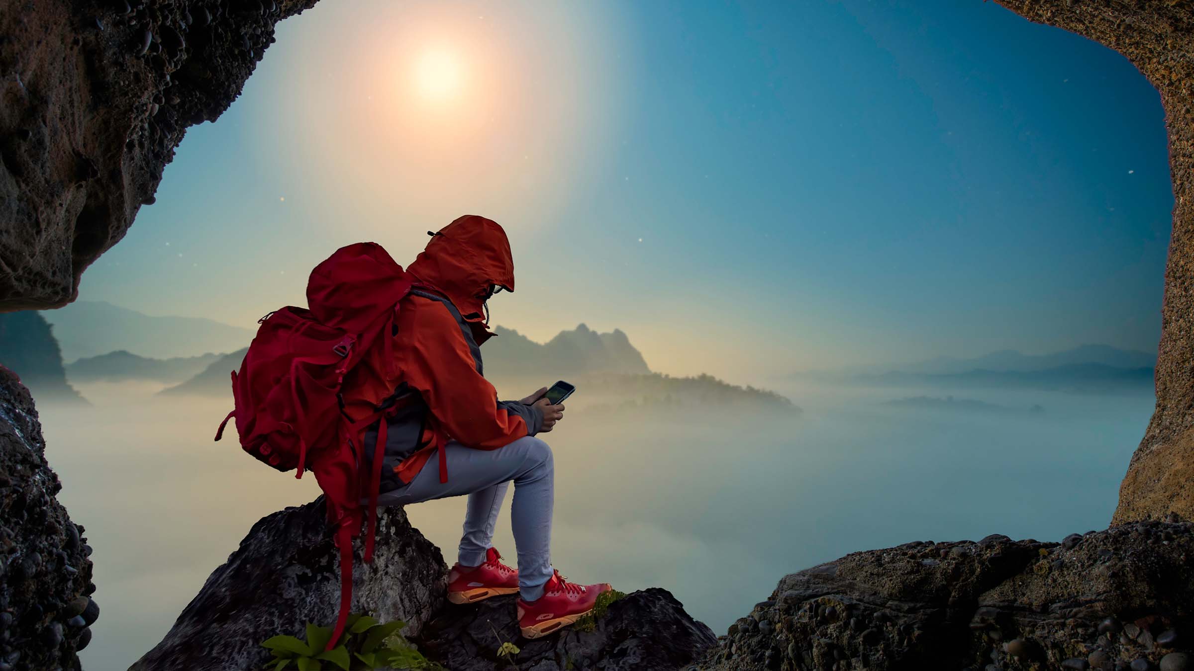 hiker on phone