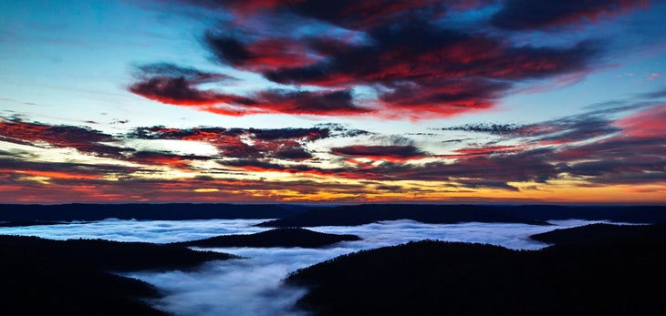 Sunrise over the Buffalo National River in Northern Arkansas with fog in the river valley