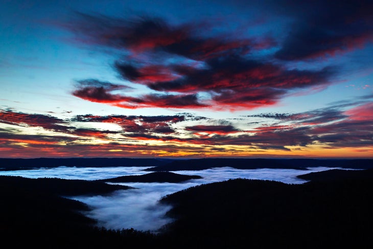 Sunrise over the Buffalo National River in Northern Arkansas with fog in the river valley