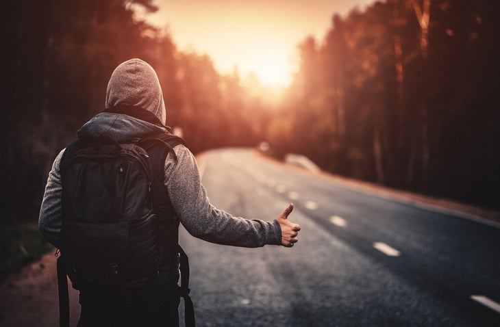 hitchhiker at sunset