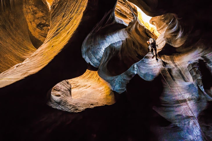 rappelling into slot canyon