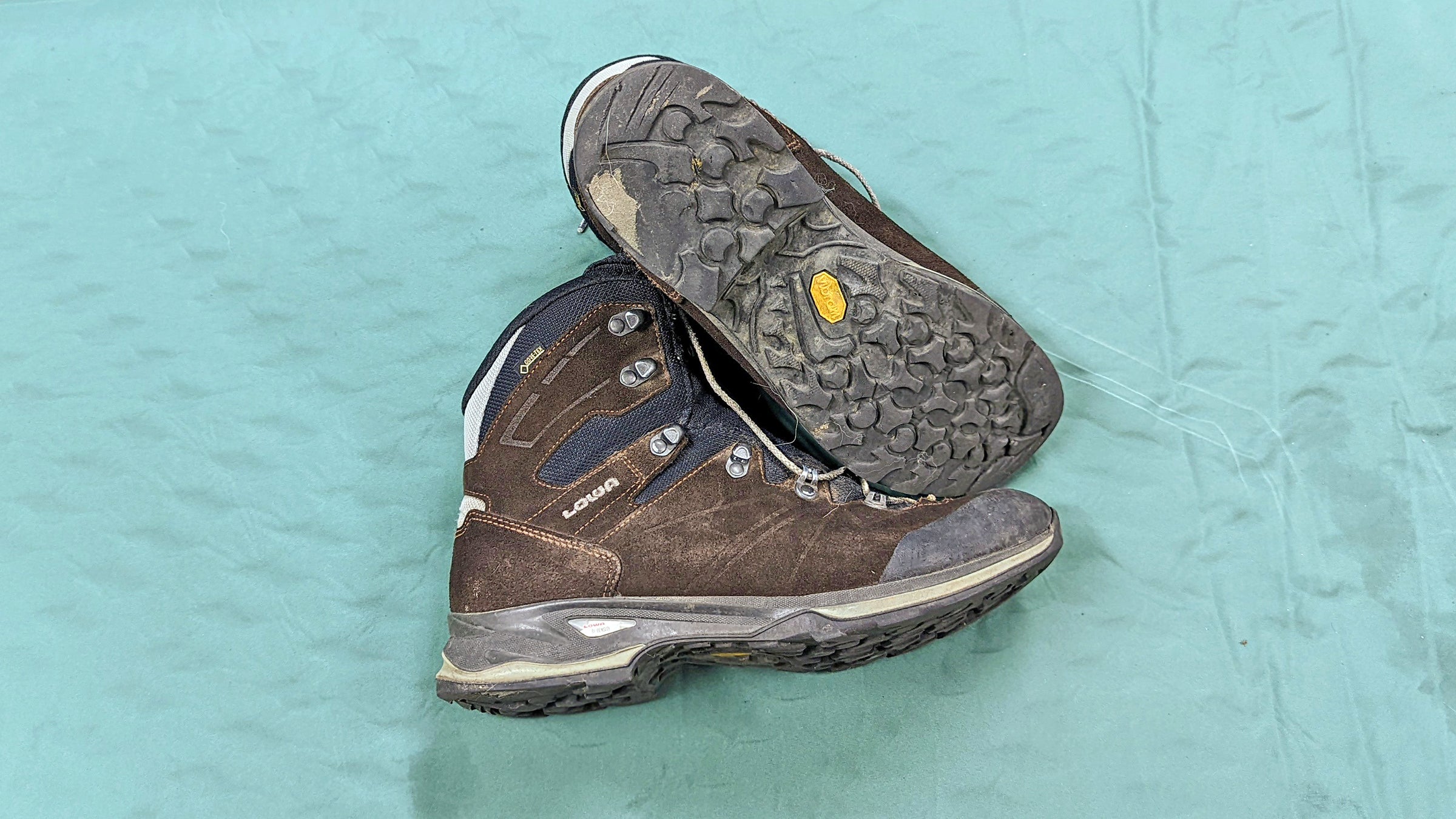 An old boot, next to the new one. 