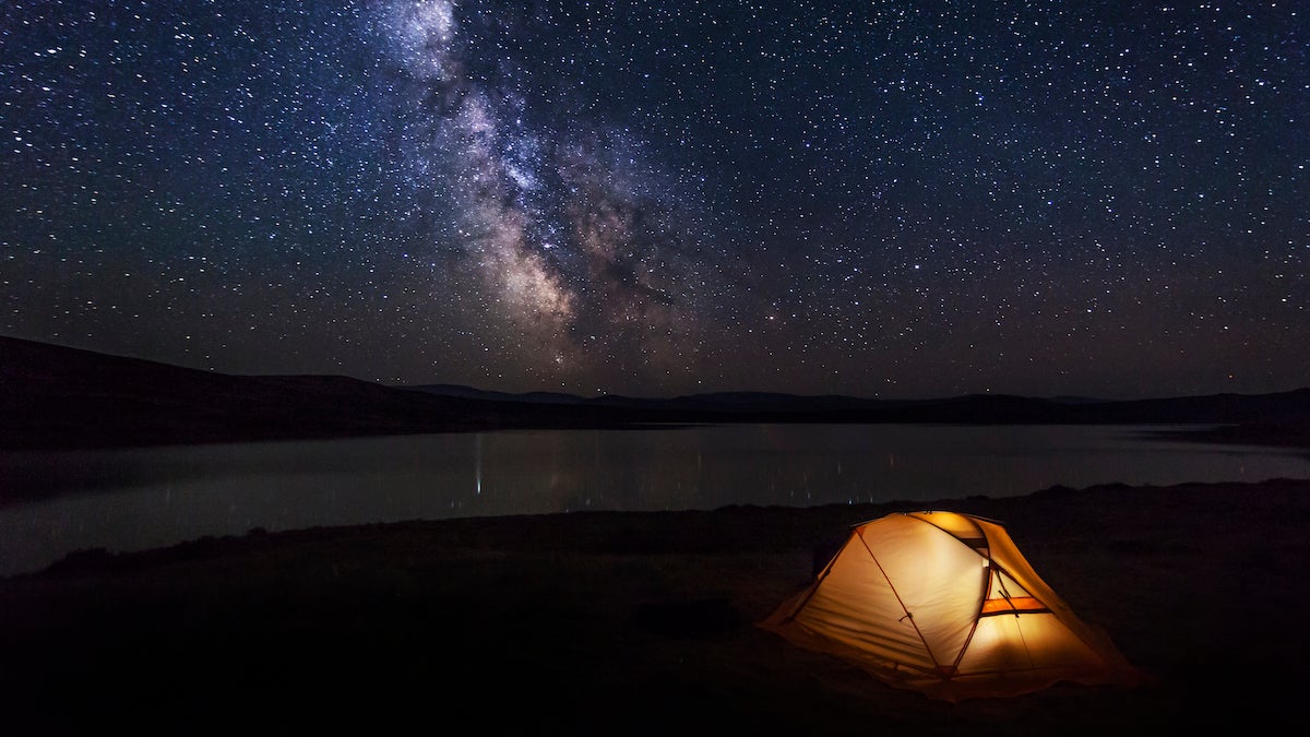 Tent under the stars on the lake