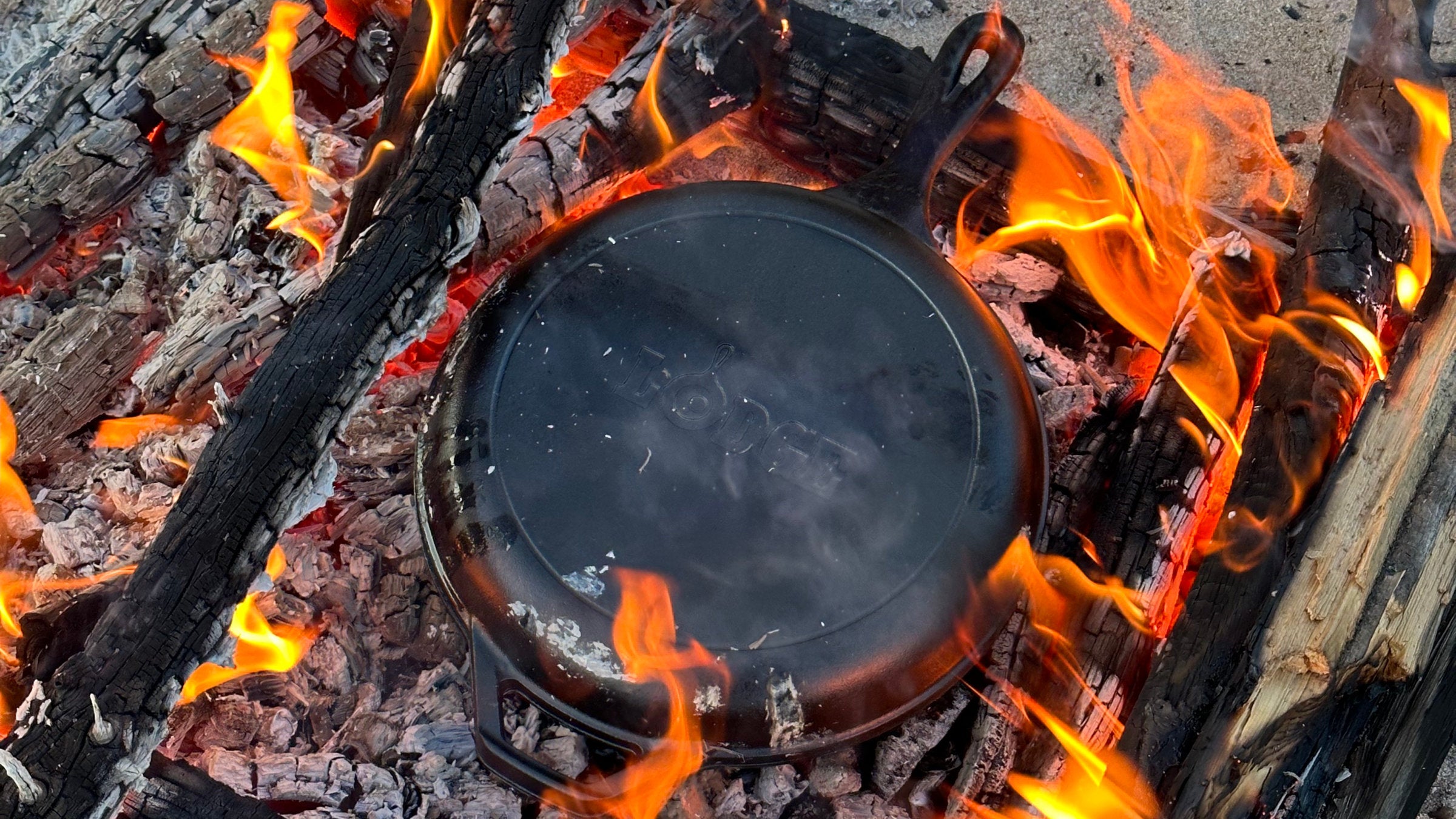 Beach cooking on a cast-iron pan