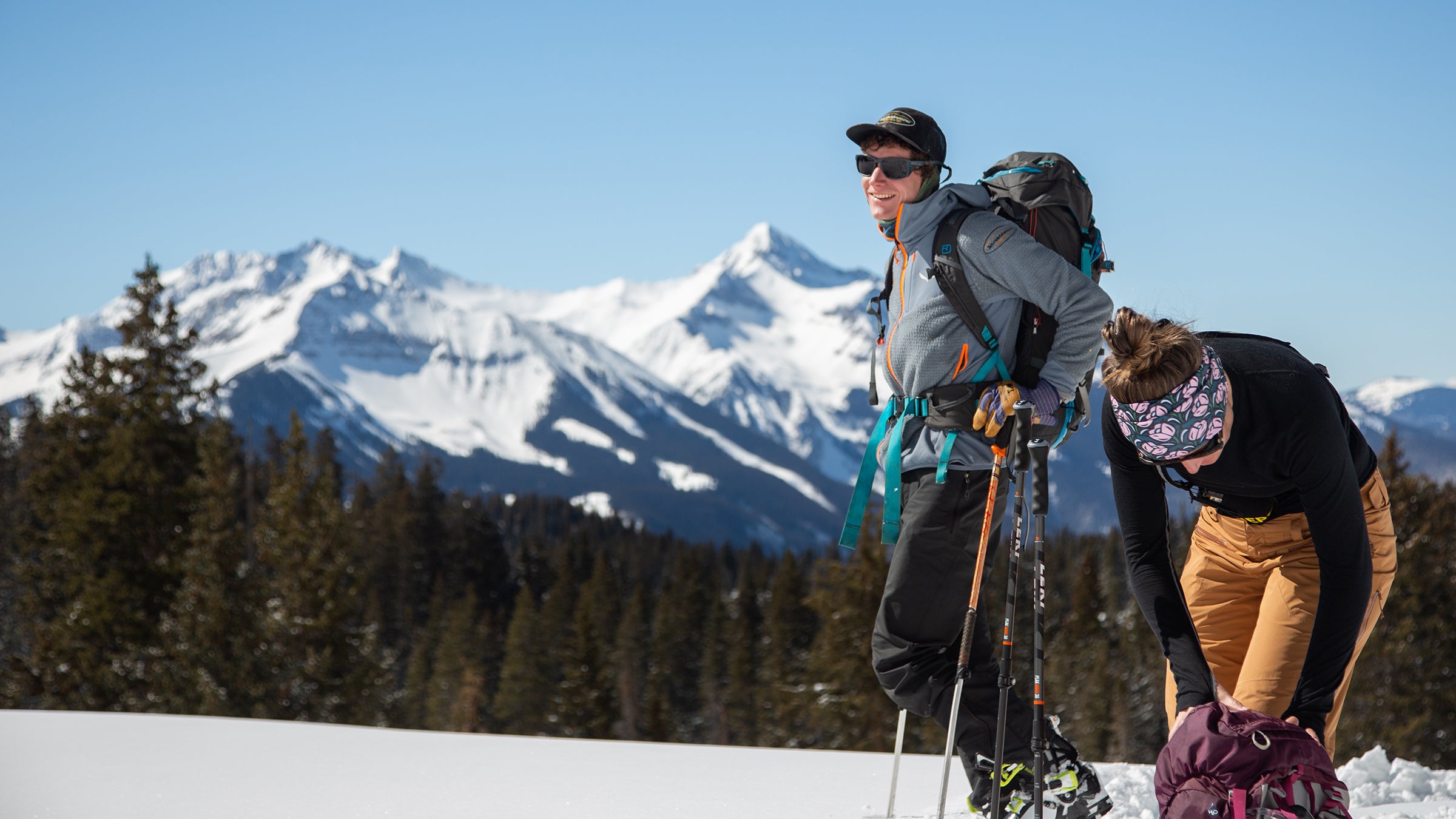 Backcountry skiers wearing layers