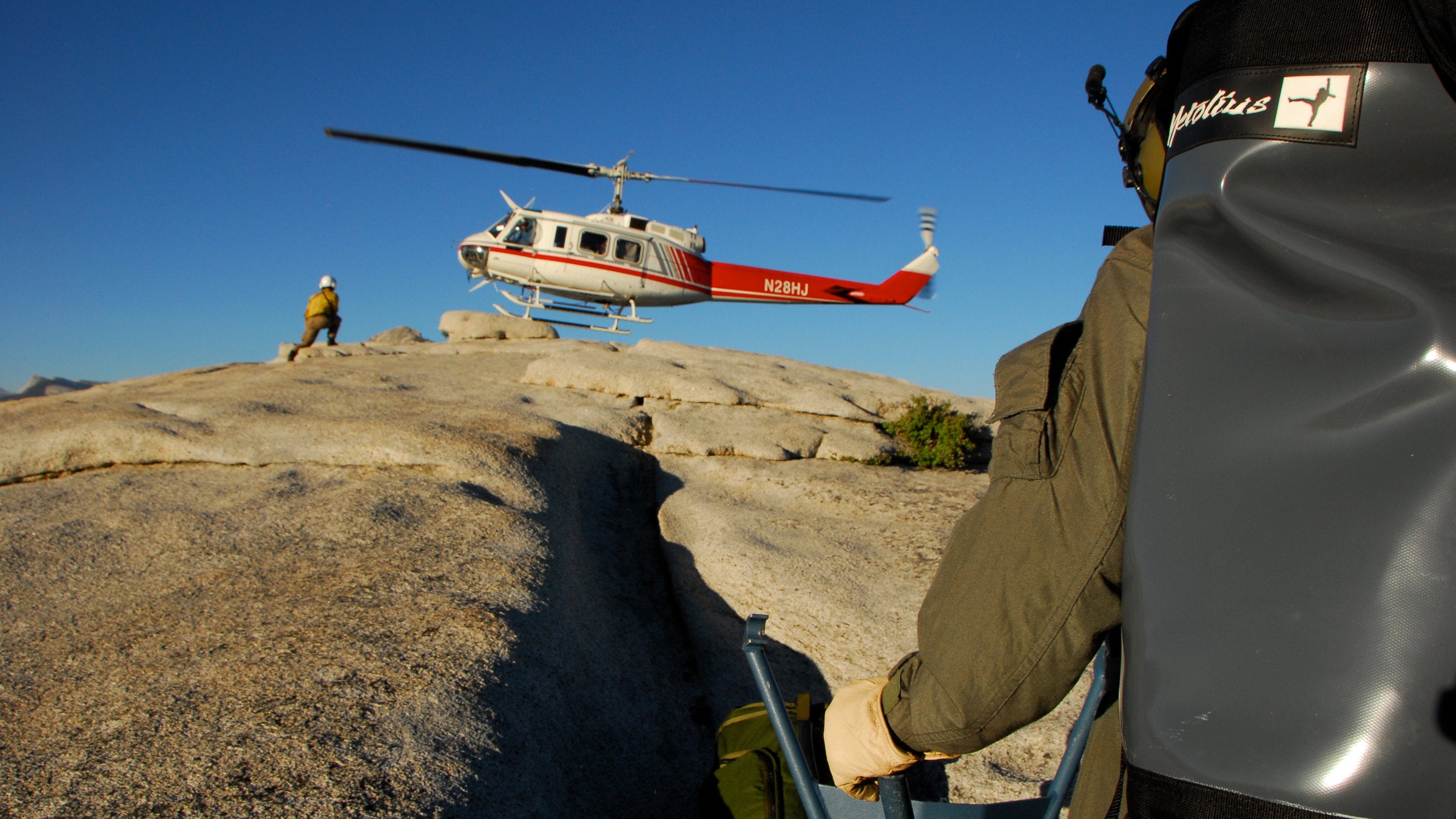 helicopter landing on half dome at Yosemite National Park