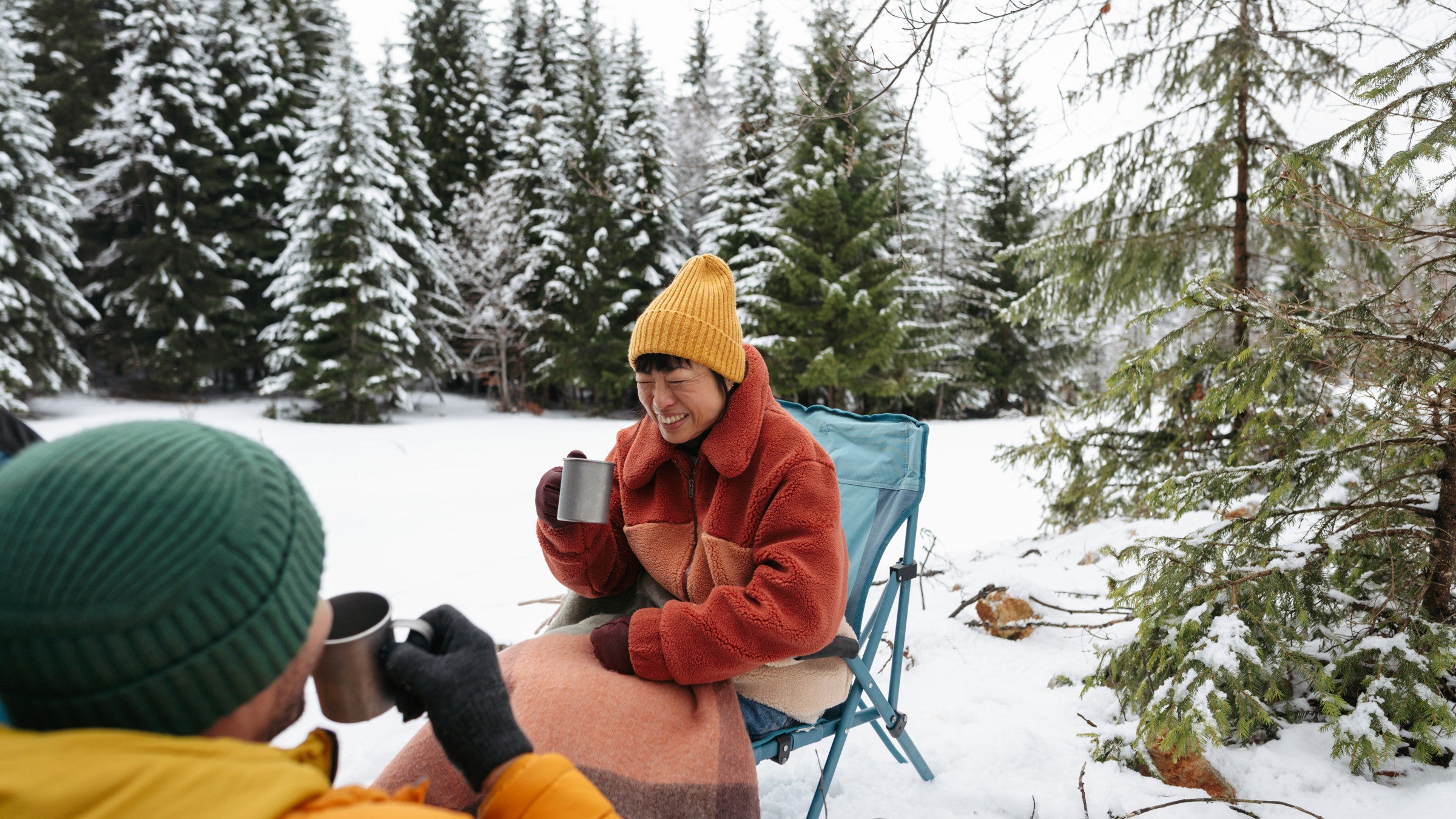 Couple having a picnic in winter