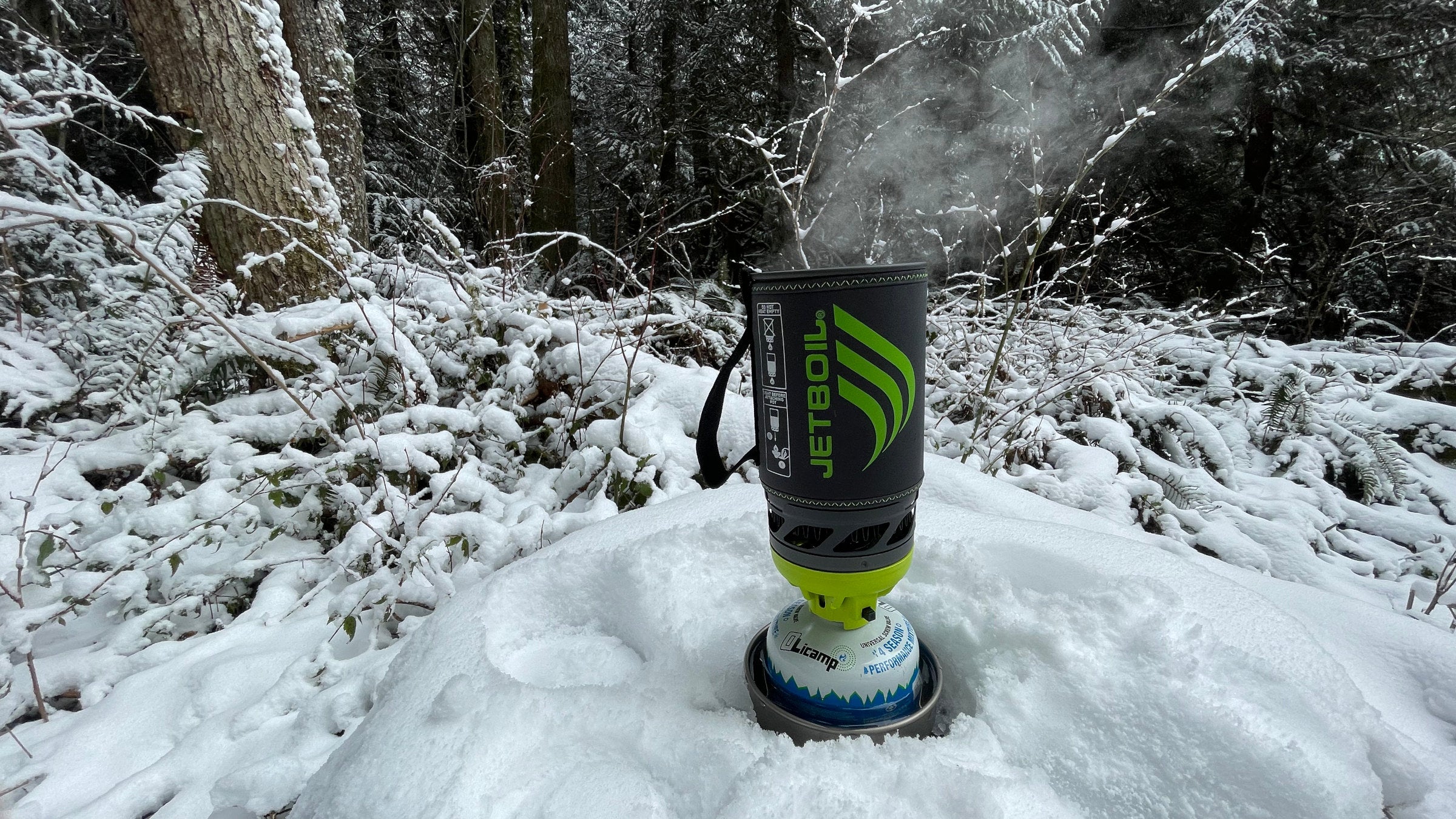 canister stove in snow