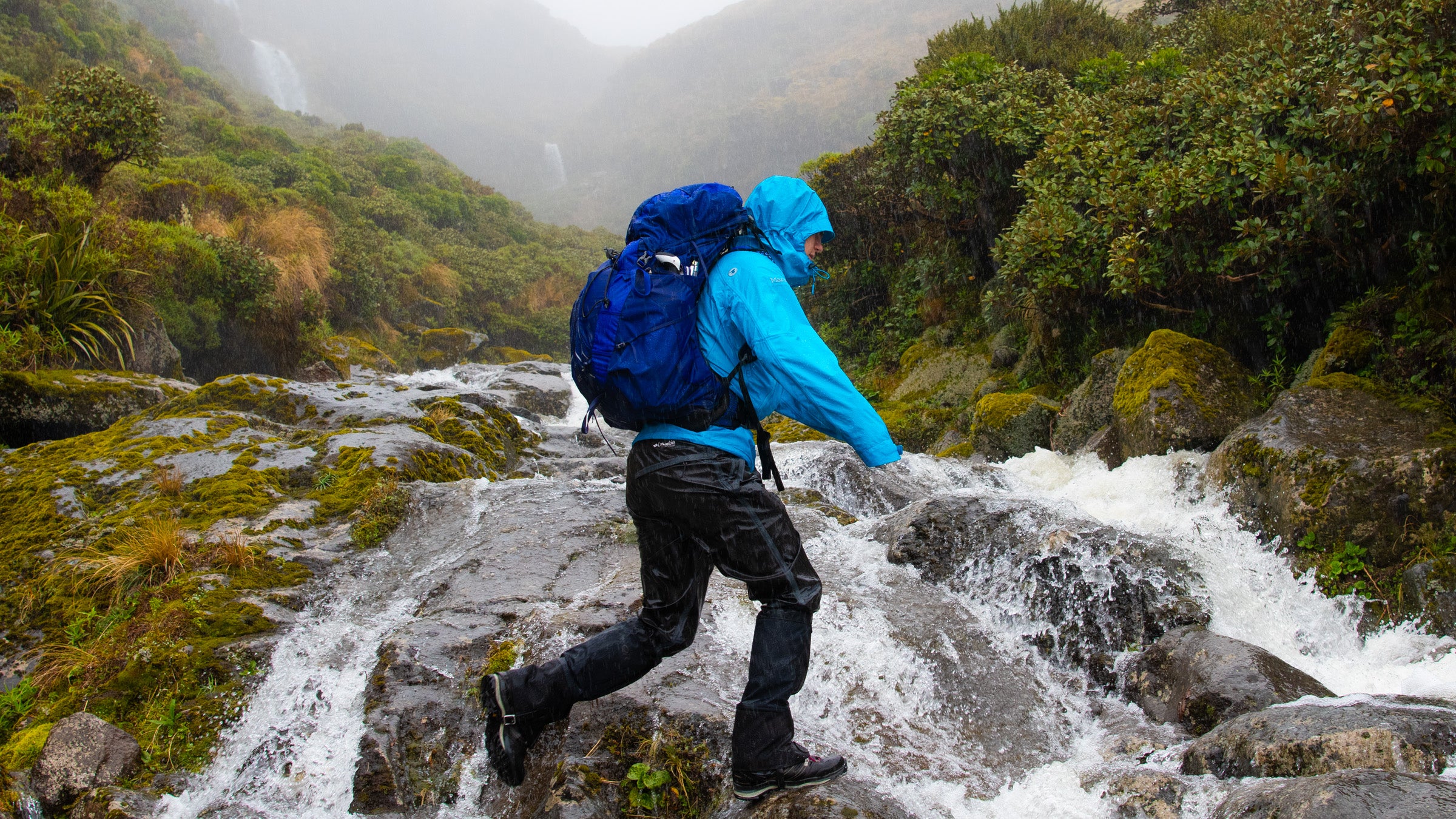 Crossing a stream during a rainstorm