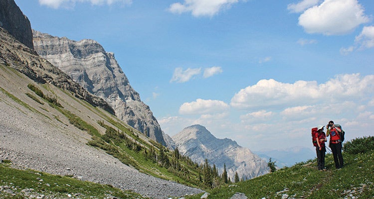 Discover the Other Rockies Hikers stop to snap photos of the glacial cirque midway through the trek. photo: Kelsey Kerlan