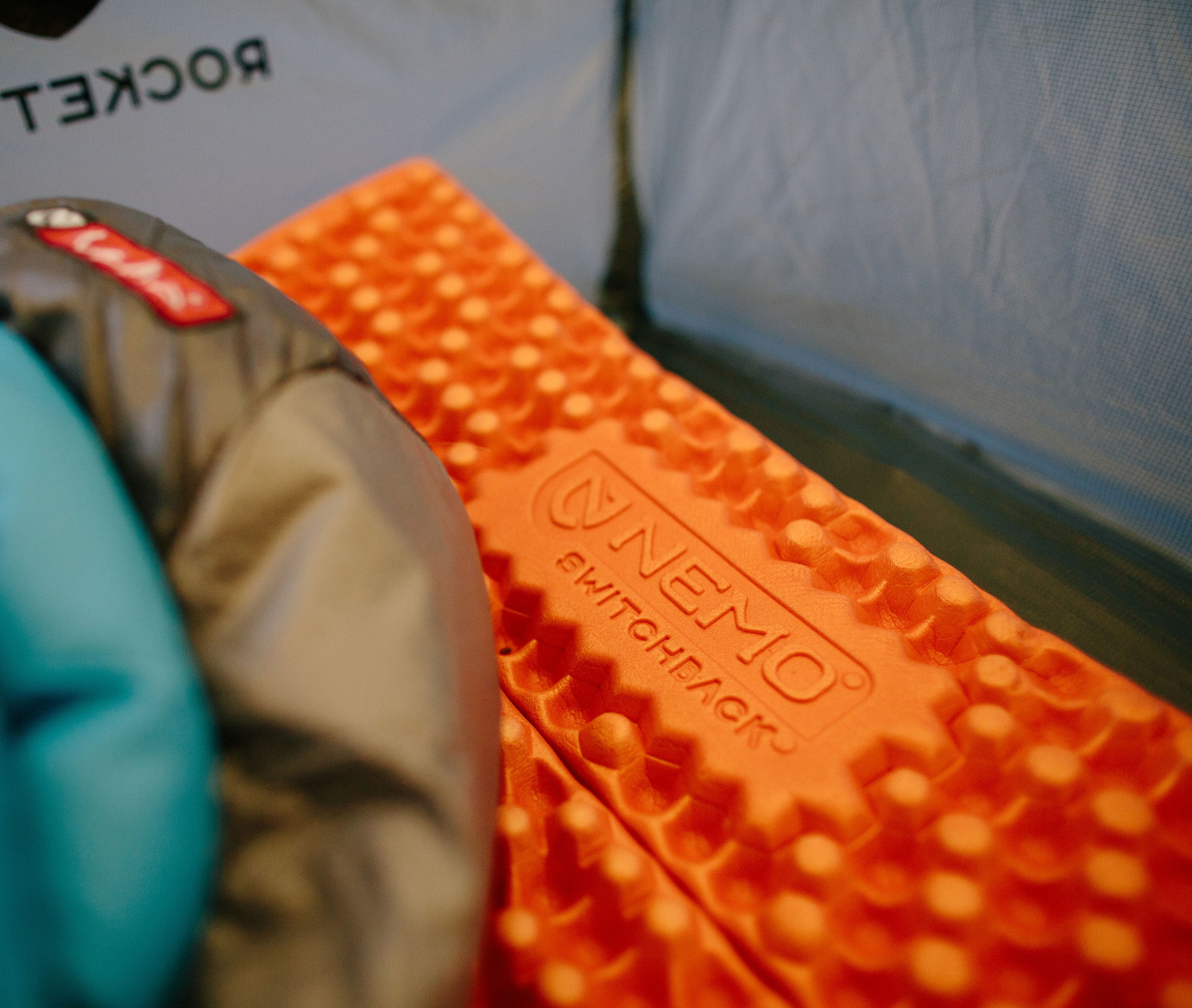 3600_SWITCHBACK_beauty Nemo Switchback sleeping pad in a tent with a sleeping bag on top.