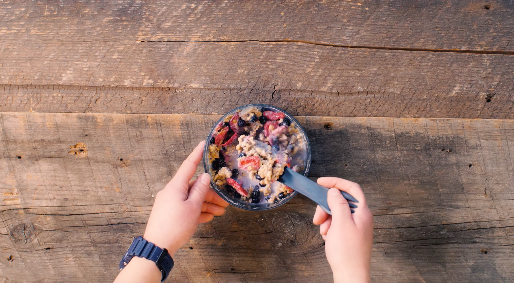Backpacking recipe for granola with milk and berries.